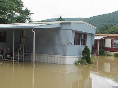 Mobile home flooded in the water